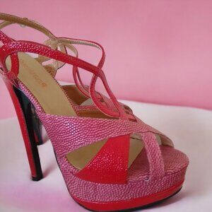 Multi red colored heels. Never worn.